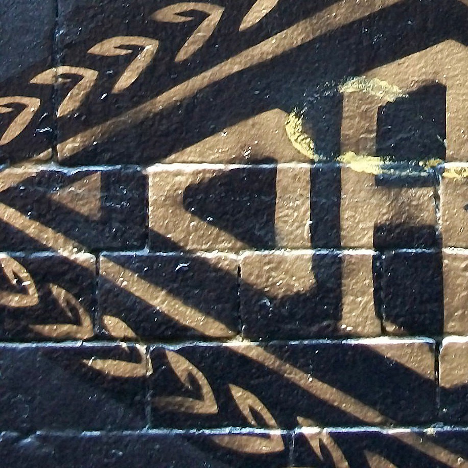 Street Art Gold on Black Brick NYC, Litho Print on Board, Photograph 18″ x 24″
