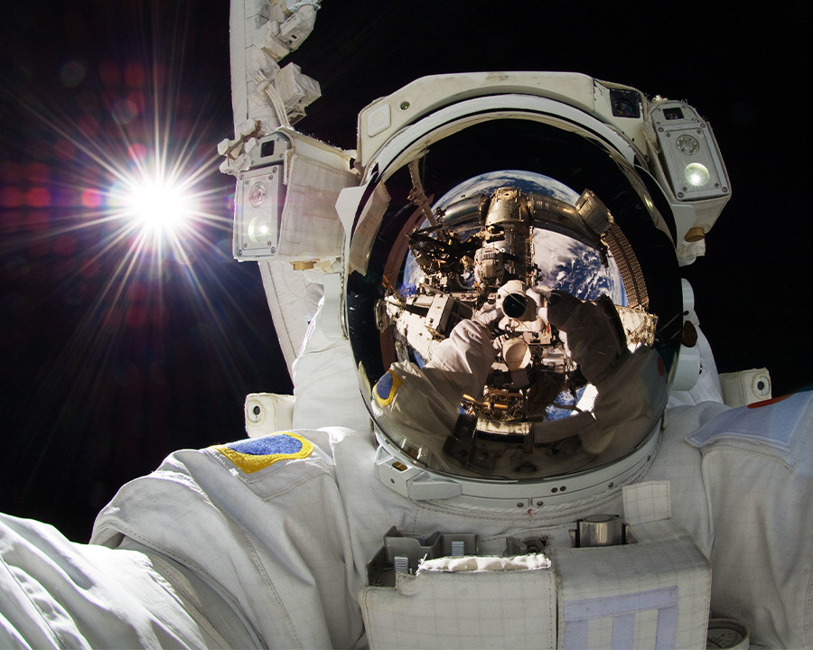 NASA astronaut in space earth reflection 8×10 Photograph Print 8″x10″