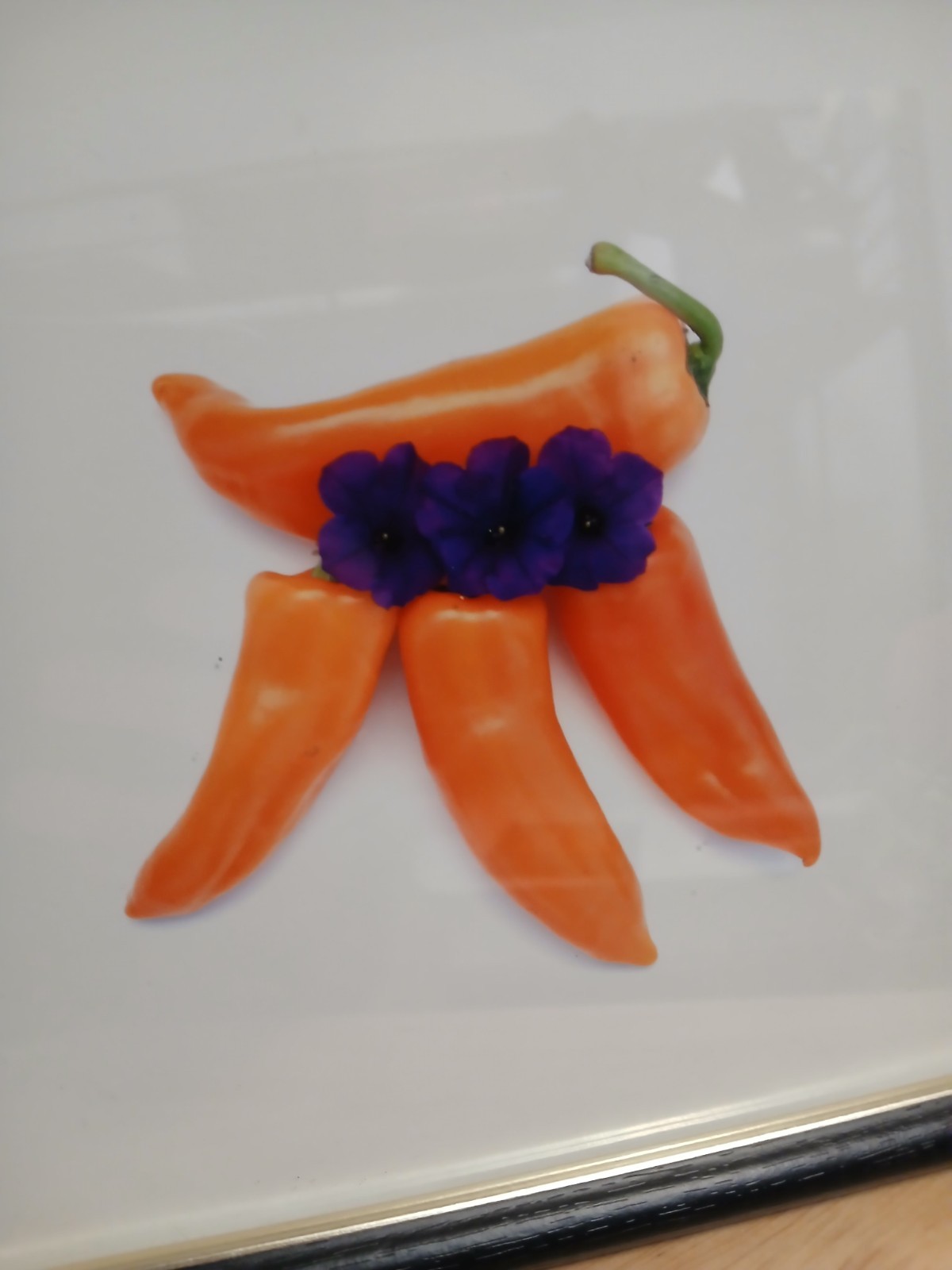 black framed photo art 12 x 9 inches 4 orange peppers with 3 purple flowers