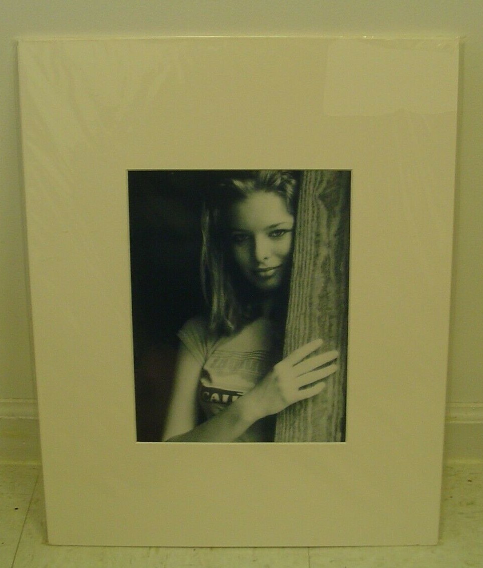 MATTED PHOTOGRAPHY Woman behind tree branch smiling by Larry Santucci 16×20