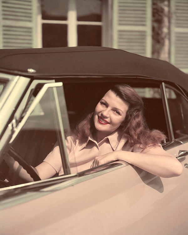 Rita Hayworth posing in 1940’s vintage car 16×20 Poster