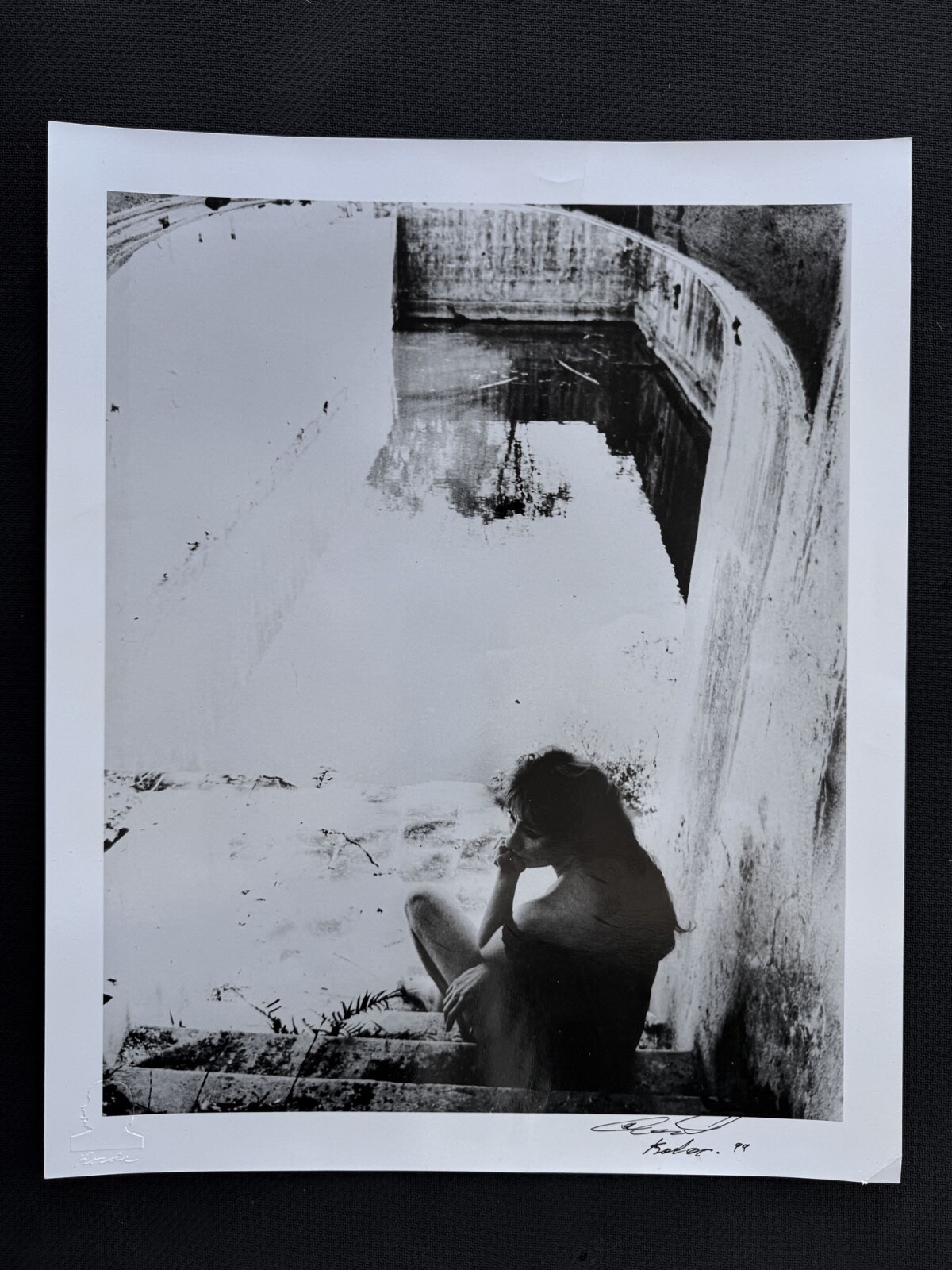 Title: Contemplation by the Empty Pool – Introspective Portrait by Korda