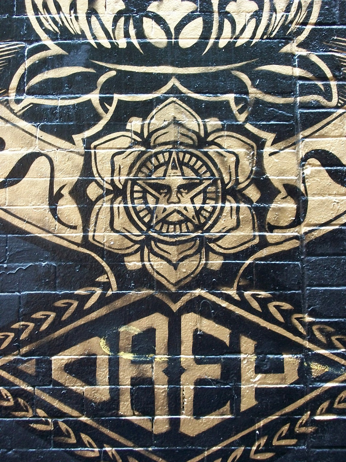 Street Art Gold on Black Brick NYC, Litho Print on Board, Photograph 18″ x 24″